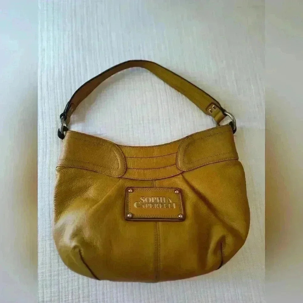 Sophia Caperelli mustard shoulder bag